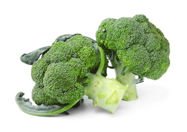 Photo of Fresh raw green broccoli isolated on white