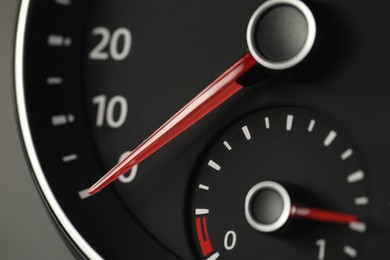 Photo of Closeup view of modern electronic car speedometer