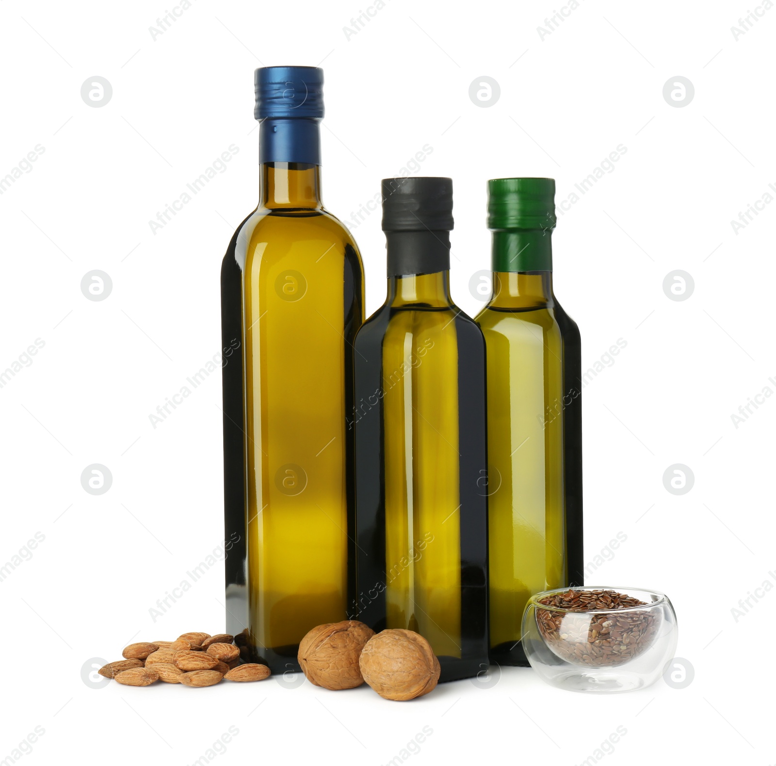 Photo of Vegetable fats. Bottles of different cooking oils and ingredients isolated on white