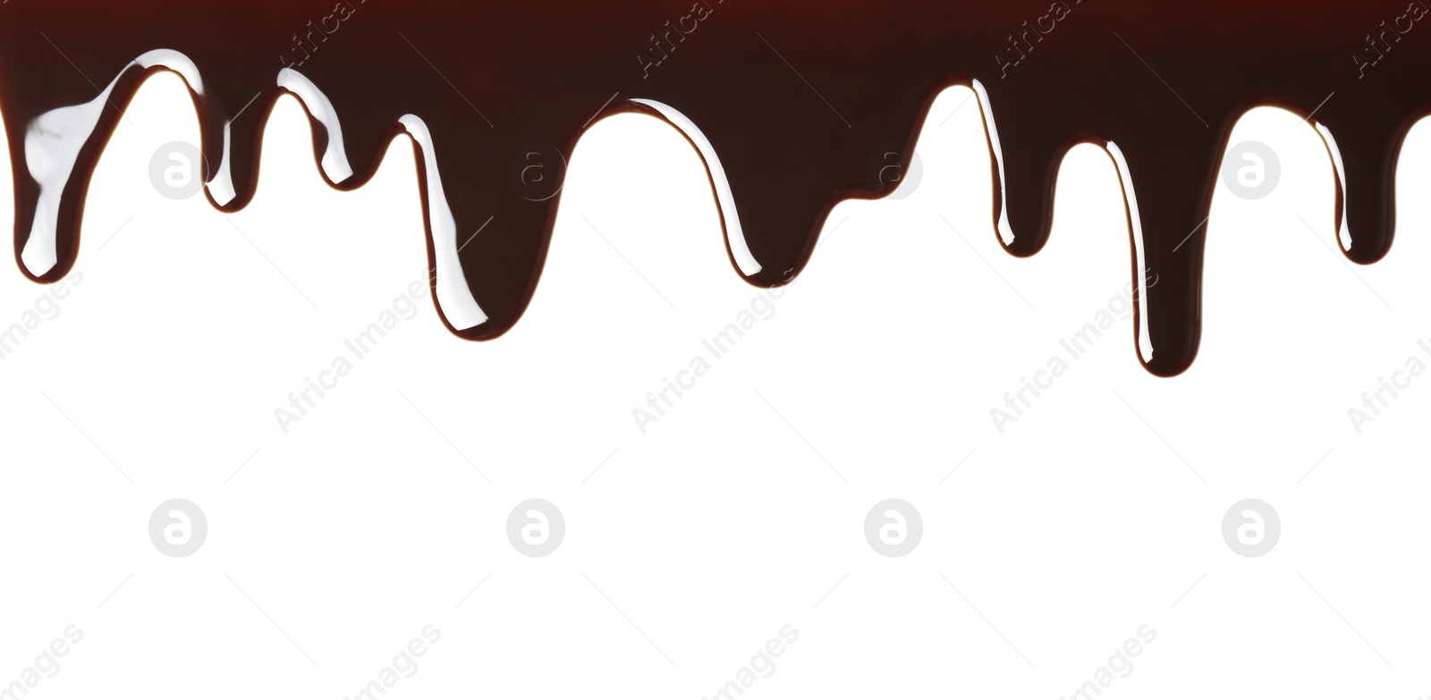 Photo of Delicious melted chocolate flowing on white background