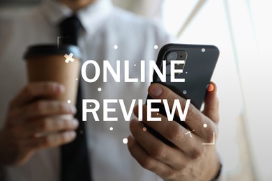 Image of Online review. Man using mobile phone to leave feedback, closeup