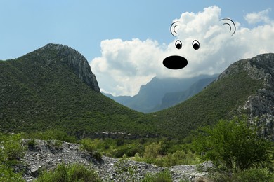 Image of Imagination and creativity. Fluffy cloud in shape of bear with drawn outline in blue sky above mountains