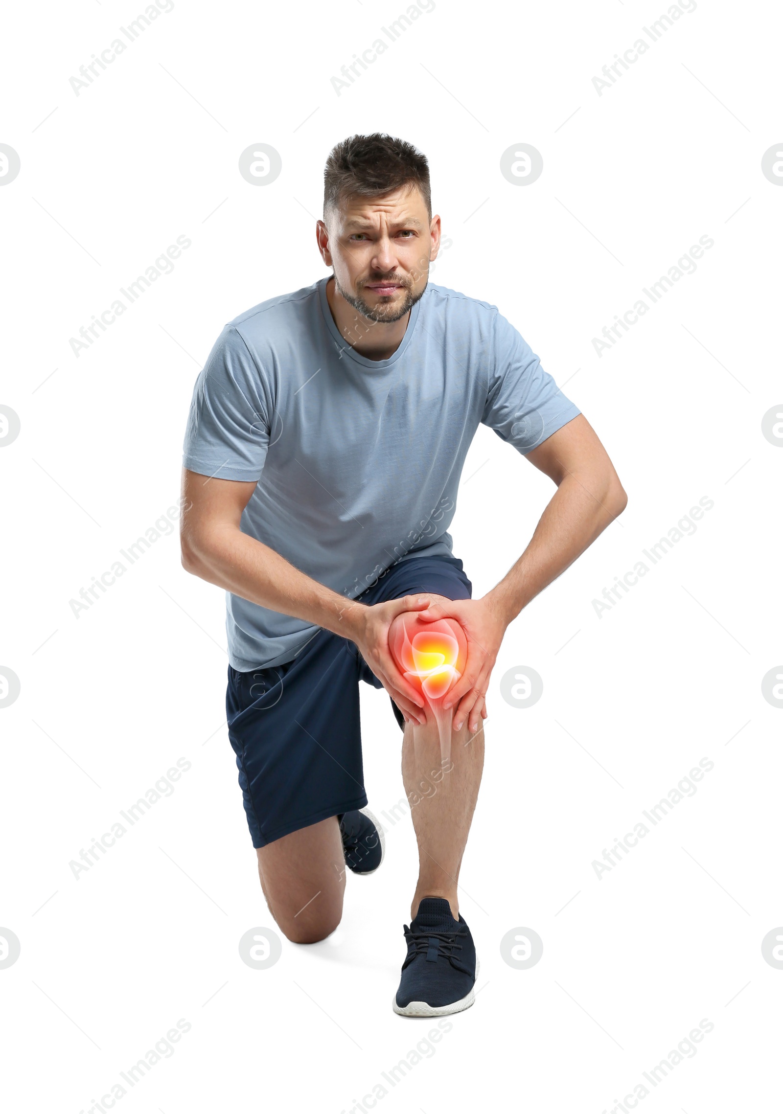 Image of Man suffering from knee pain on white background 