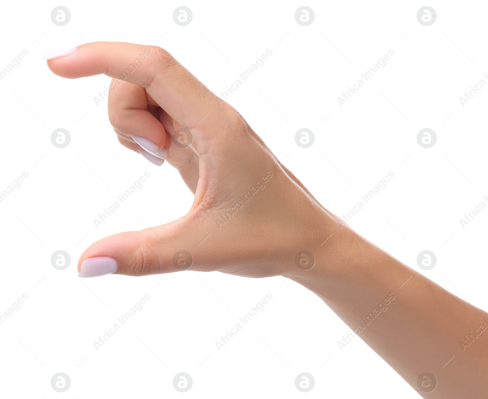 Photo of Woman holding something in fingers on white background, closeup