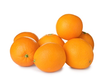 Pile of ripe oranges isolated on white