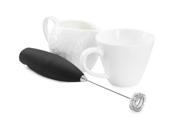 Milk frother wand, cup and pitcher isolated on white