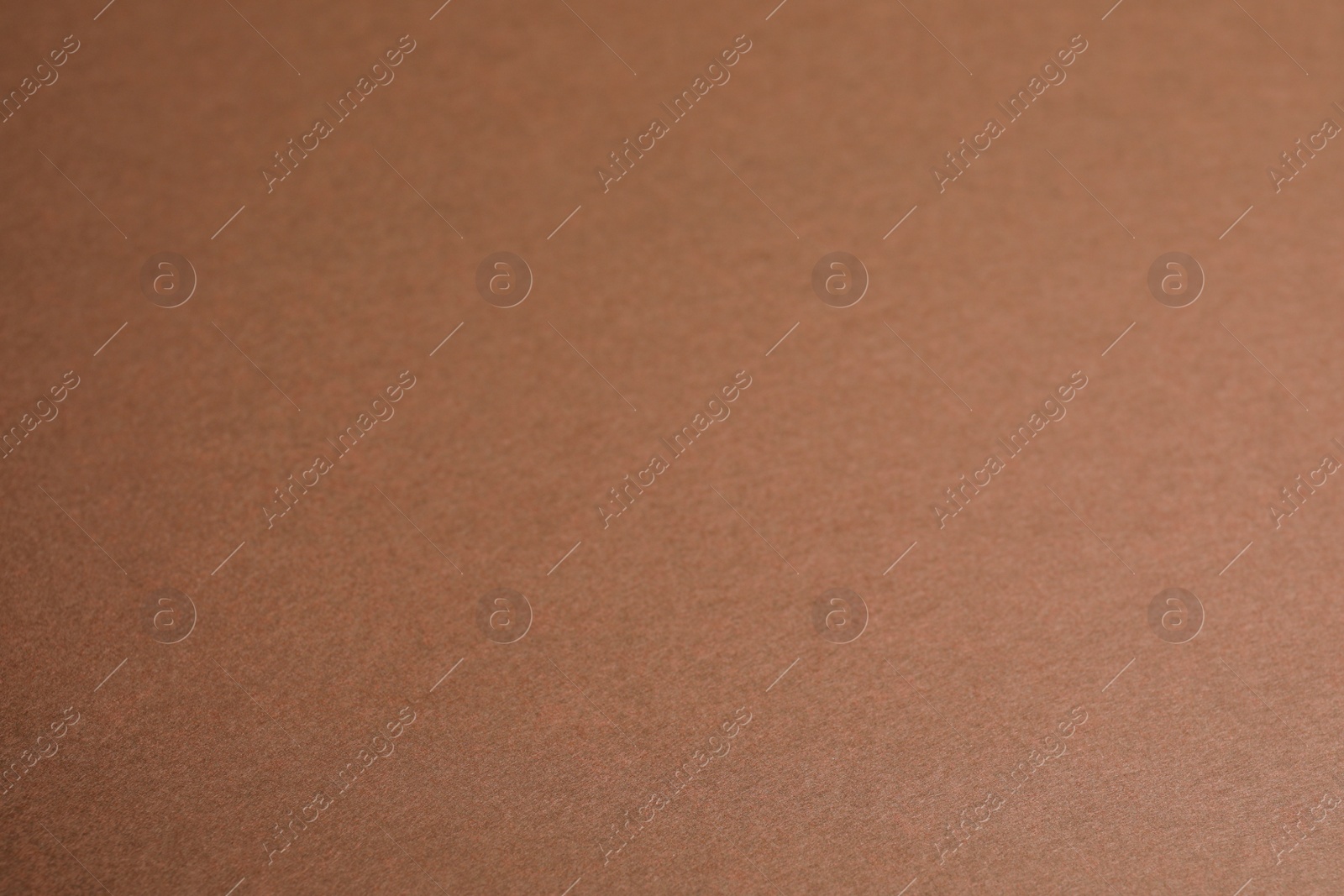 Photo of Brown sheet of cardboard as background, closeup