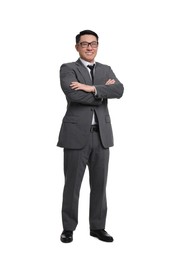 Businessman in suit wearing glasses on white background