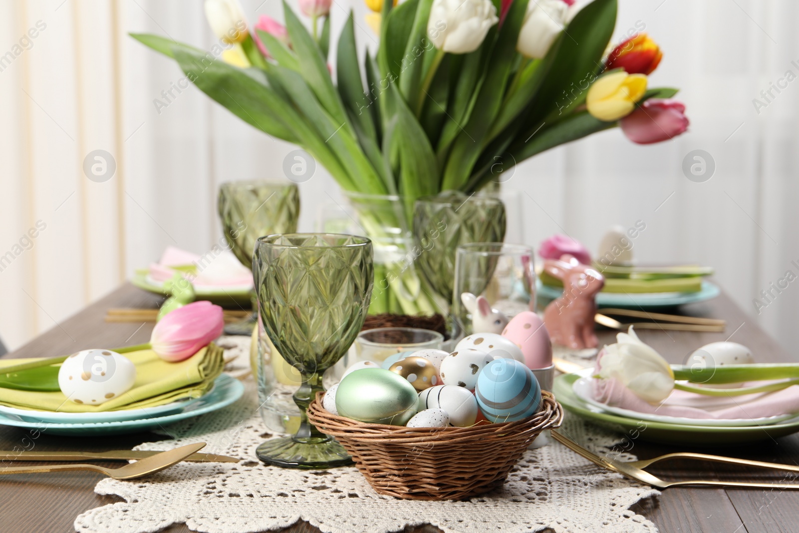 Photo of Festive table setting with beautiful flowers. Easter celebration