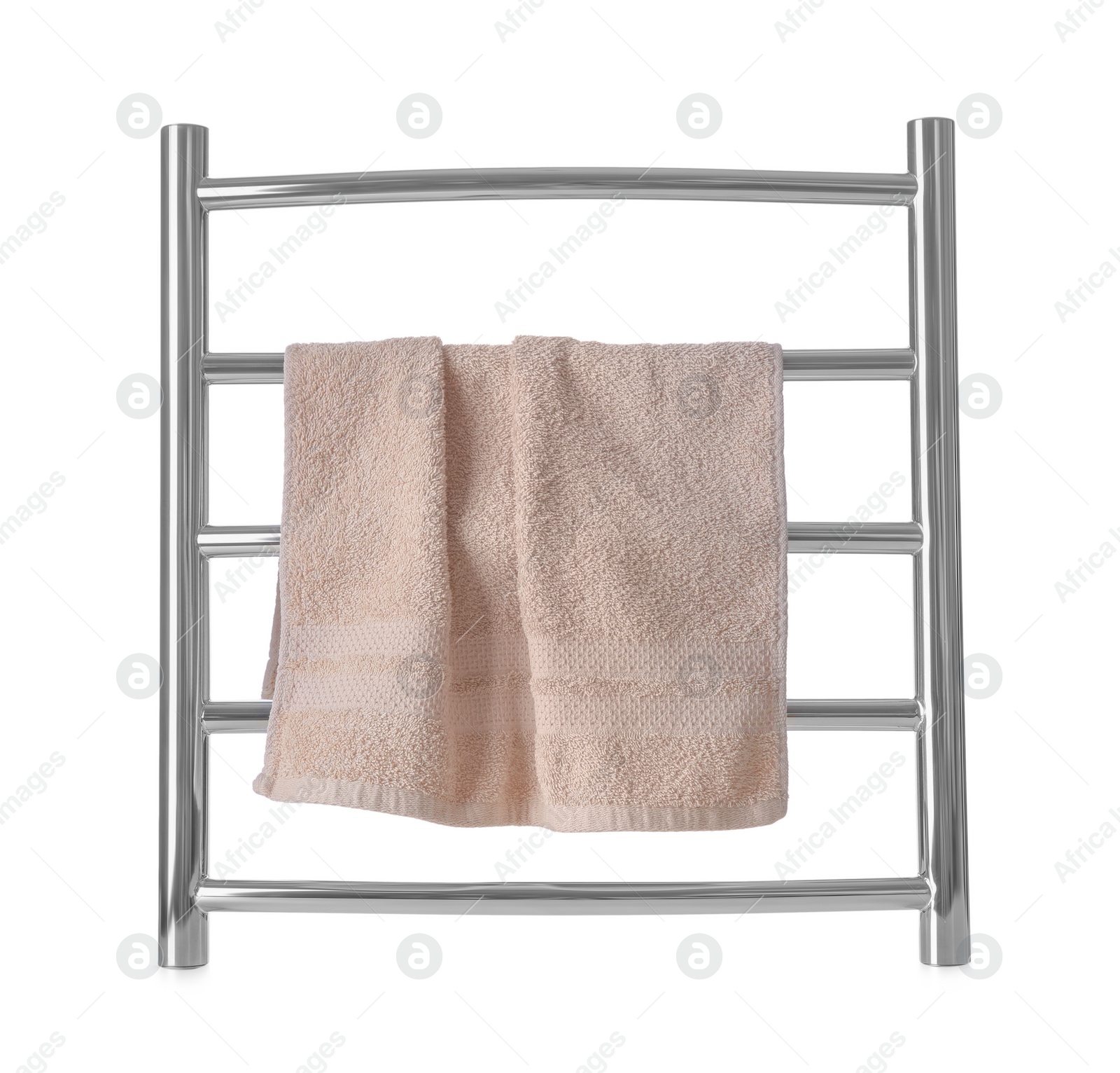 Photo of Modern heated towel rail with warm soft towel isolated on white