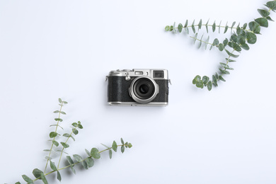 Photo of Camera for professional photographer on white background, top view