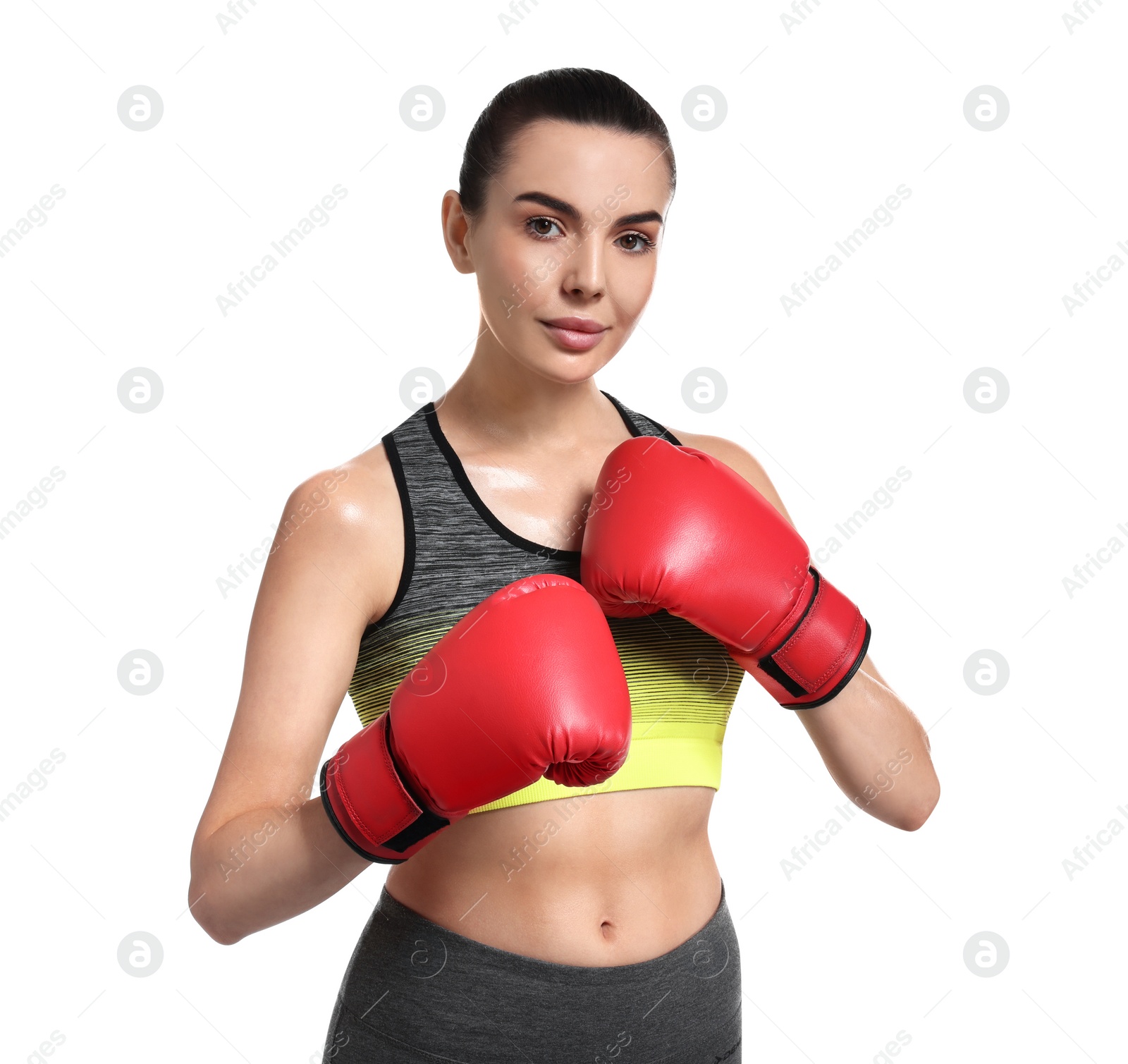 Photo of Beautiful woman in boxing gloves on white background