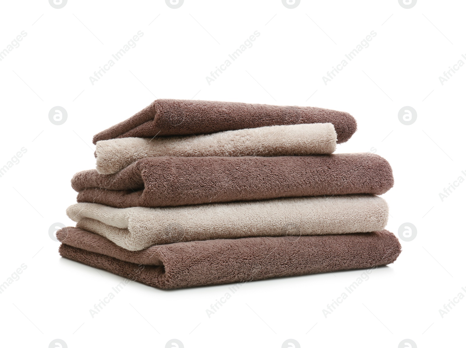 Photo of Stack of clean folded towels on white background