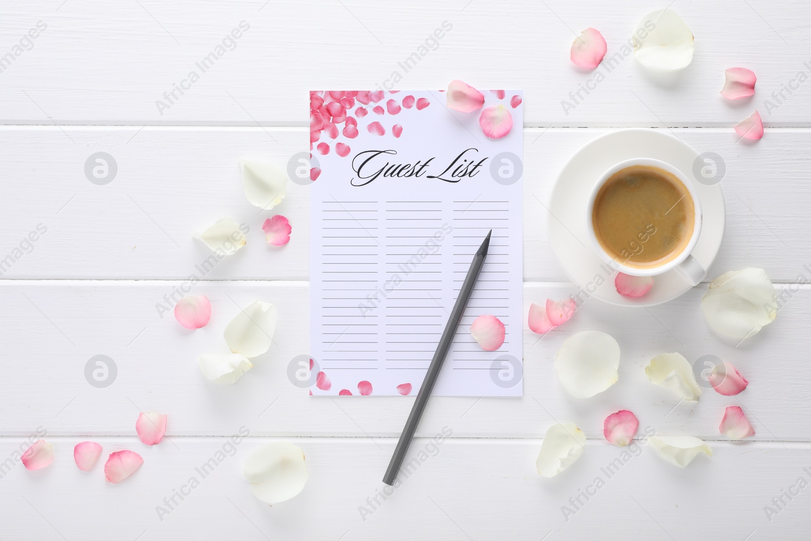 Photo of Guest list, pencil, coffee and petals on white wooden table, flat lay. Space for text