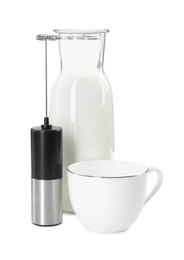 Milk frother wand, cup and glass carafe isolated on white