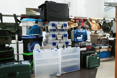 Photo of Boxes for fishing equipment in sports shop