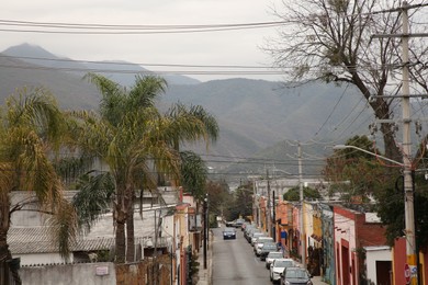 San Pedro Garza Garcia, Mexico – February 8, 2023: View on street with cars and beautiful buildings