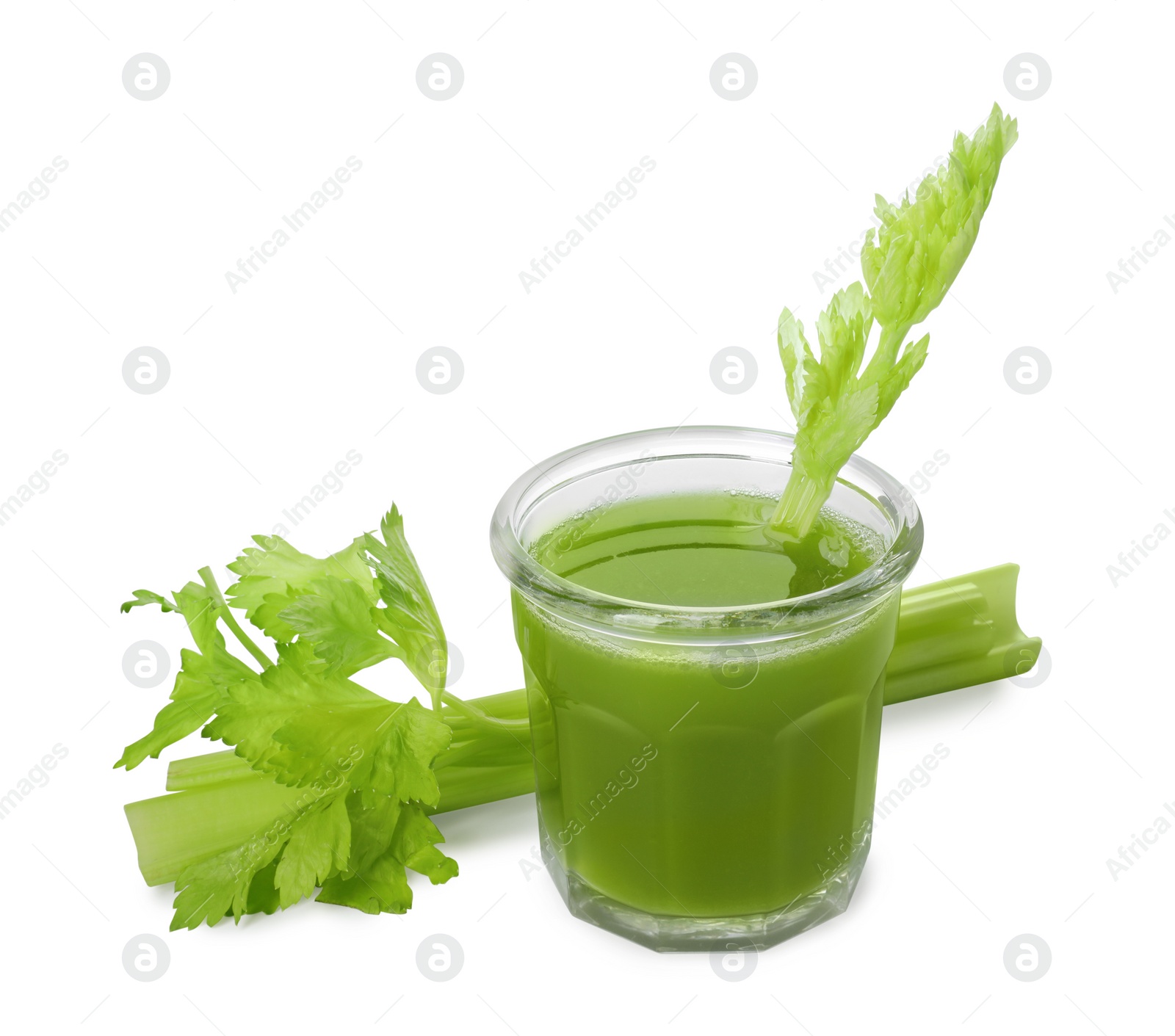 Photo of Glass of celery juice and fresh vegetable on white background