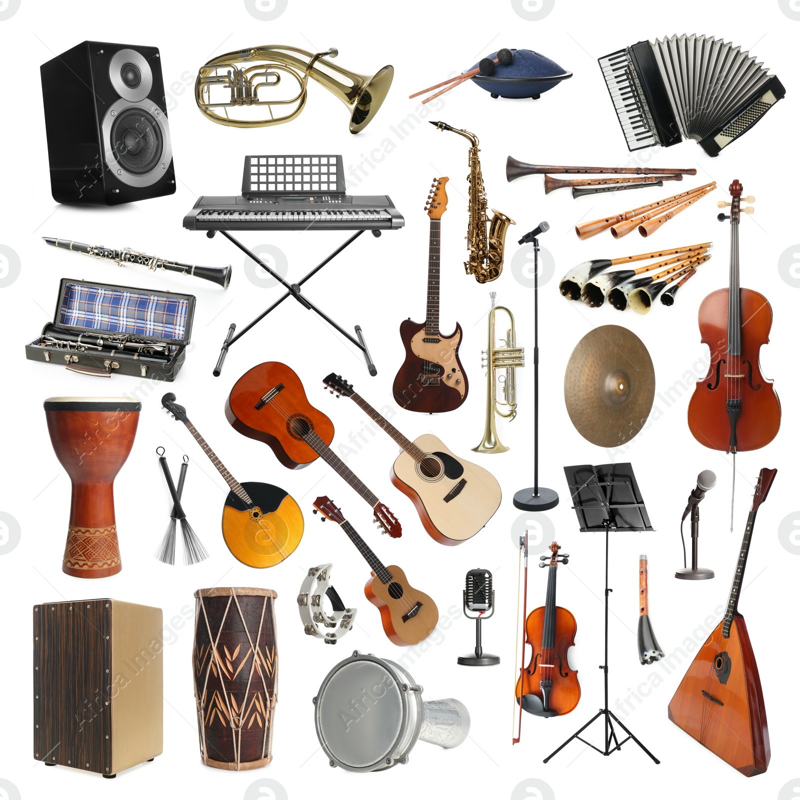 Image of Collection of different musical instruments on white background