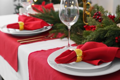 Beautiful table setting with Christmas decor indoors, space for text