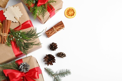 Photo of Composition with Christmas gifts on white background, top view