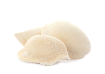 Photo of Raw dumplings with tasty filling on white background