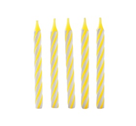 Yellow striped birthday candles isolated on white