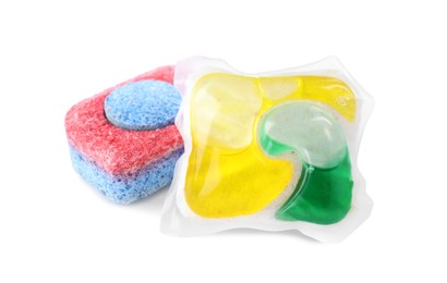 Photo of Dishwasher detergent pod and tablet on white background