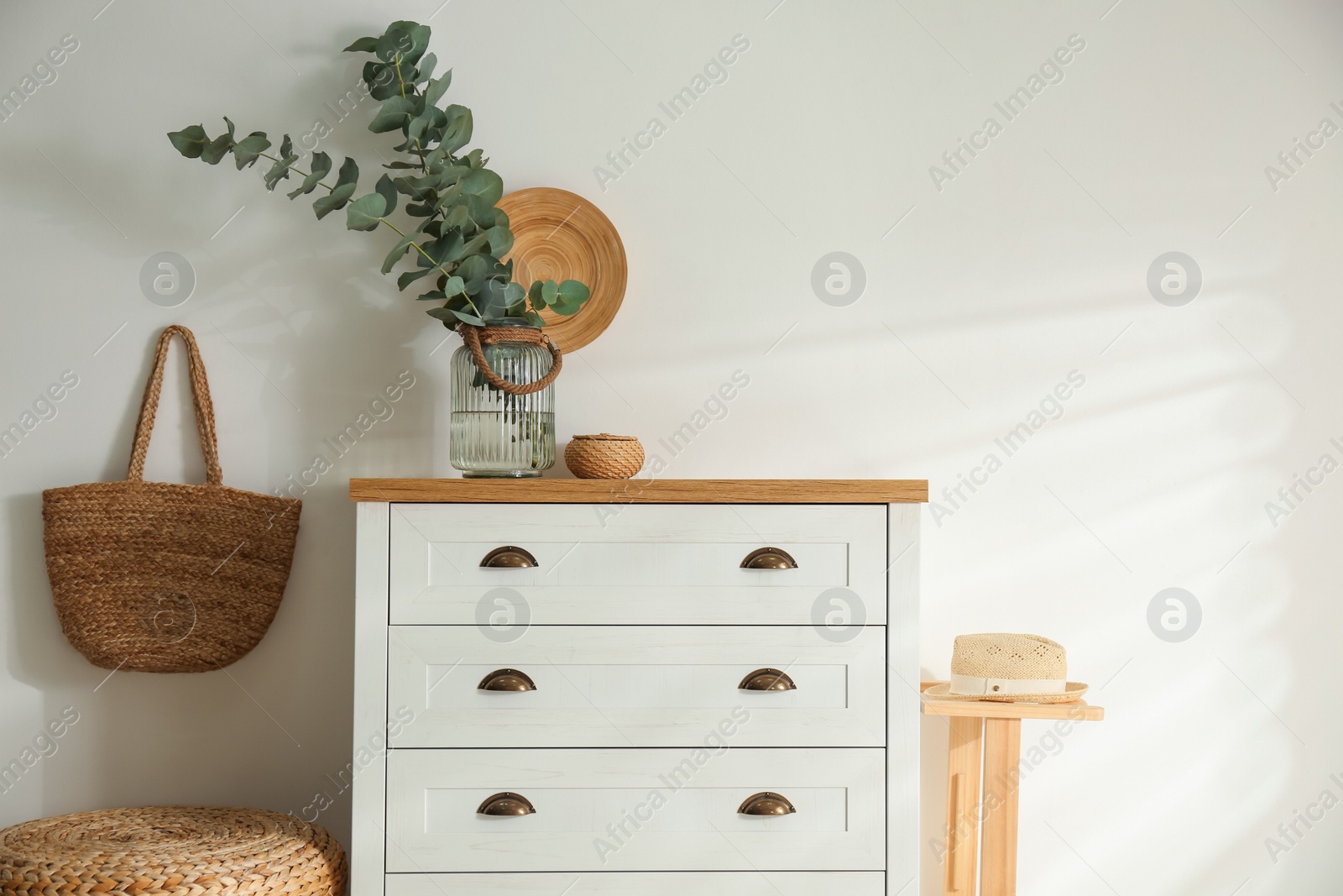 Photo of Chest of drawers in stylish room interior