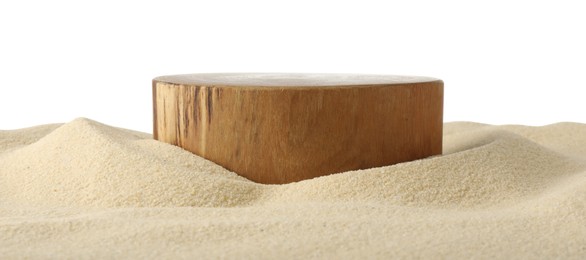 Photo of Presentation of product. Wooden podium on sand against white background