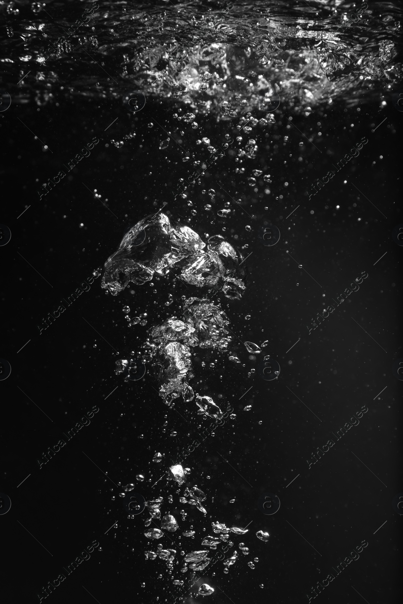 Photo of Air bubbles in water on black background