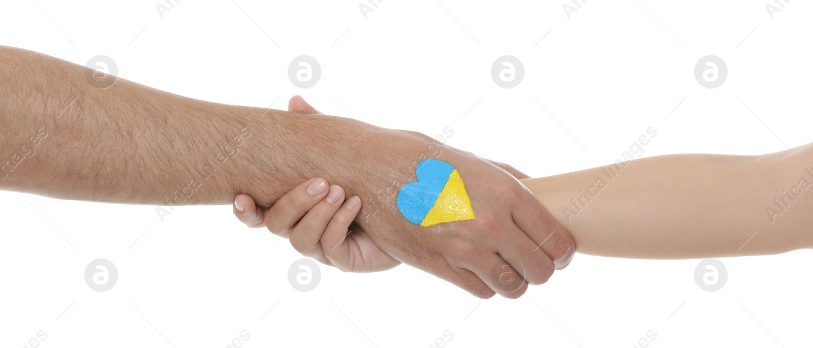 Photo of Man and woman with painted heart in colors of Ukrainian flag on her hand against white background, closeup