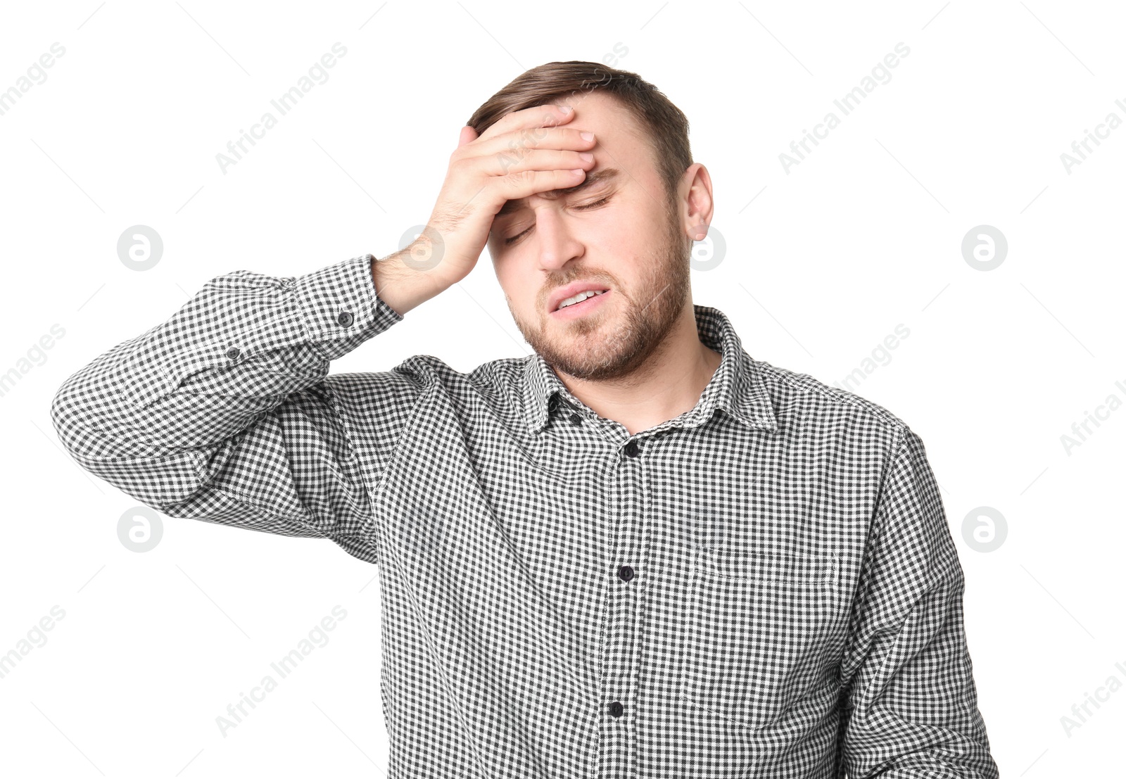 Photo of Young man suffering from headache on white background