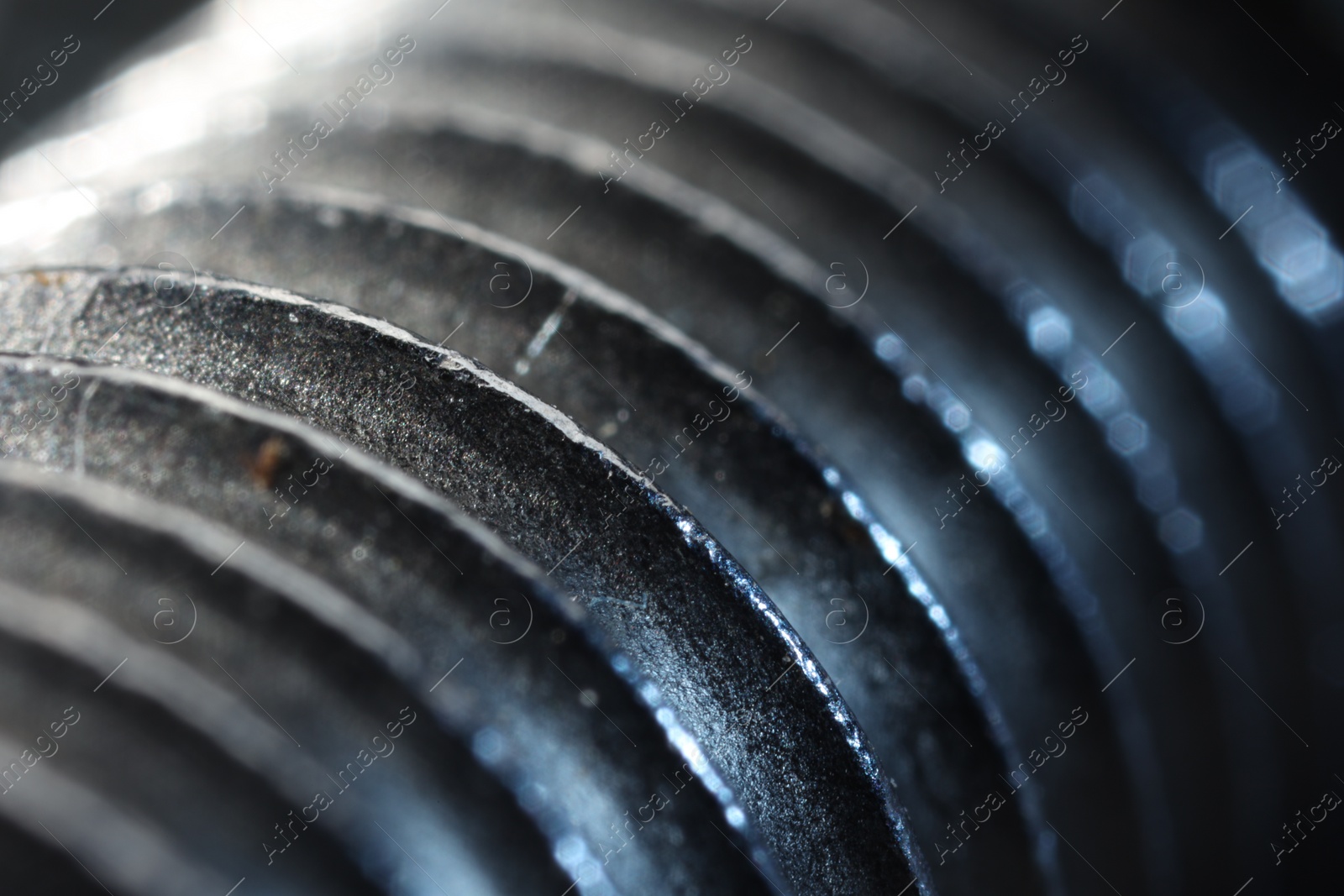 Photo of Texture of modern metal fastener, macro view