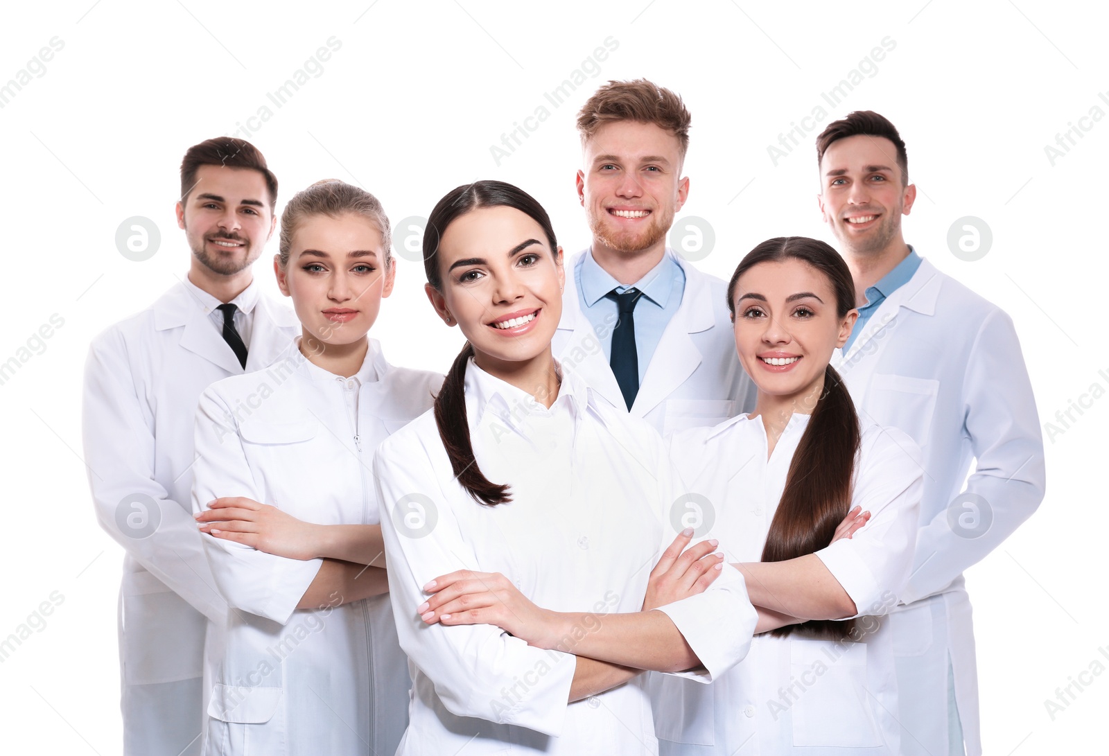 Photo of Group of medical doctors isolated on white. Unity concept