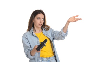 Photo of Confused woman with game controller on white background