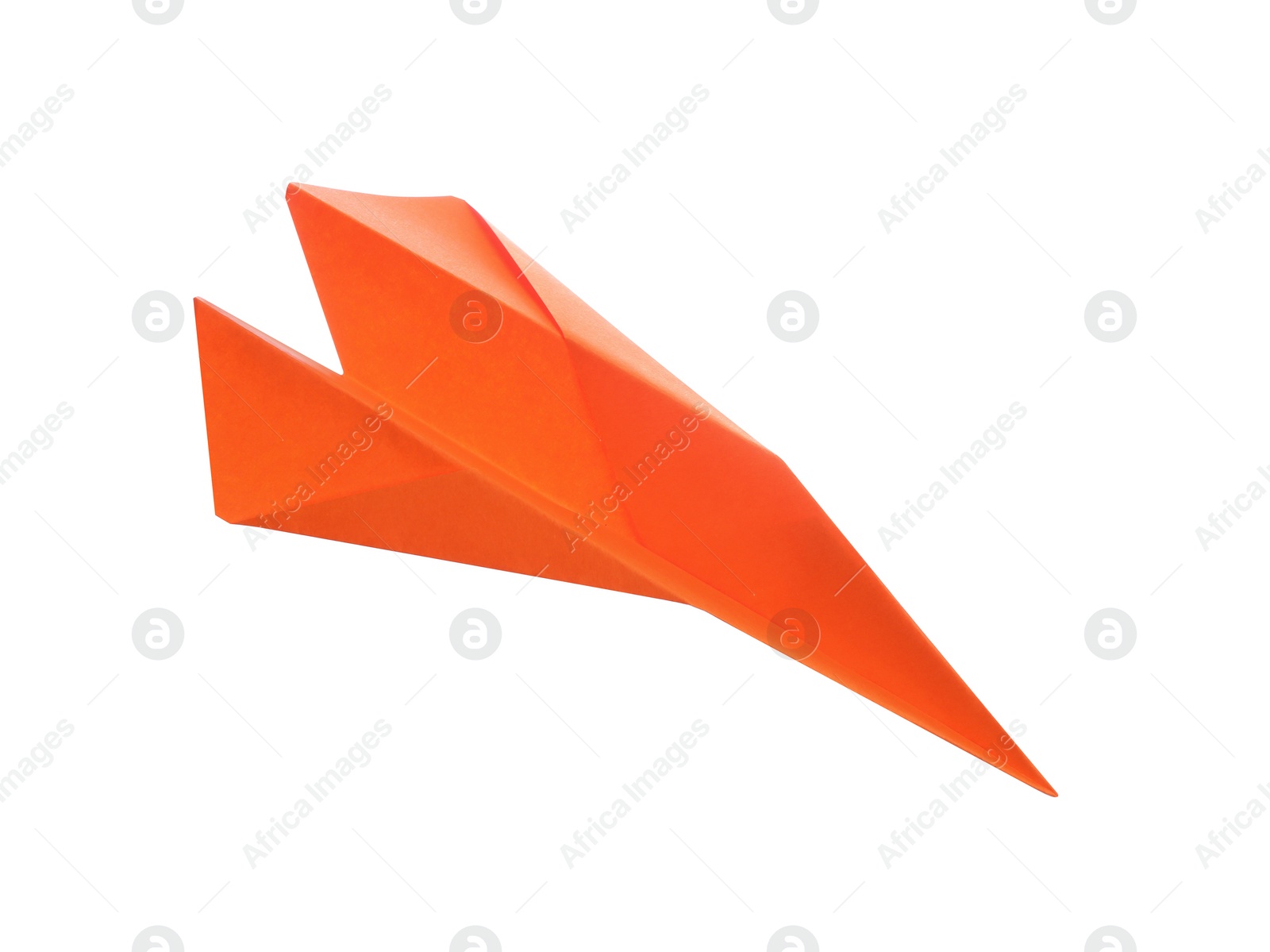 Photo of Handmade orange paper plane isolated on white