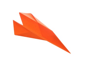 Photo of Handmade orange paper plane isolated on white