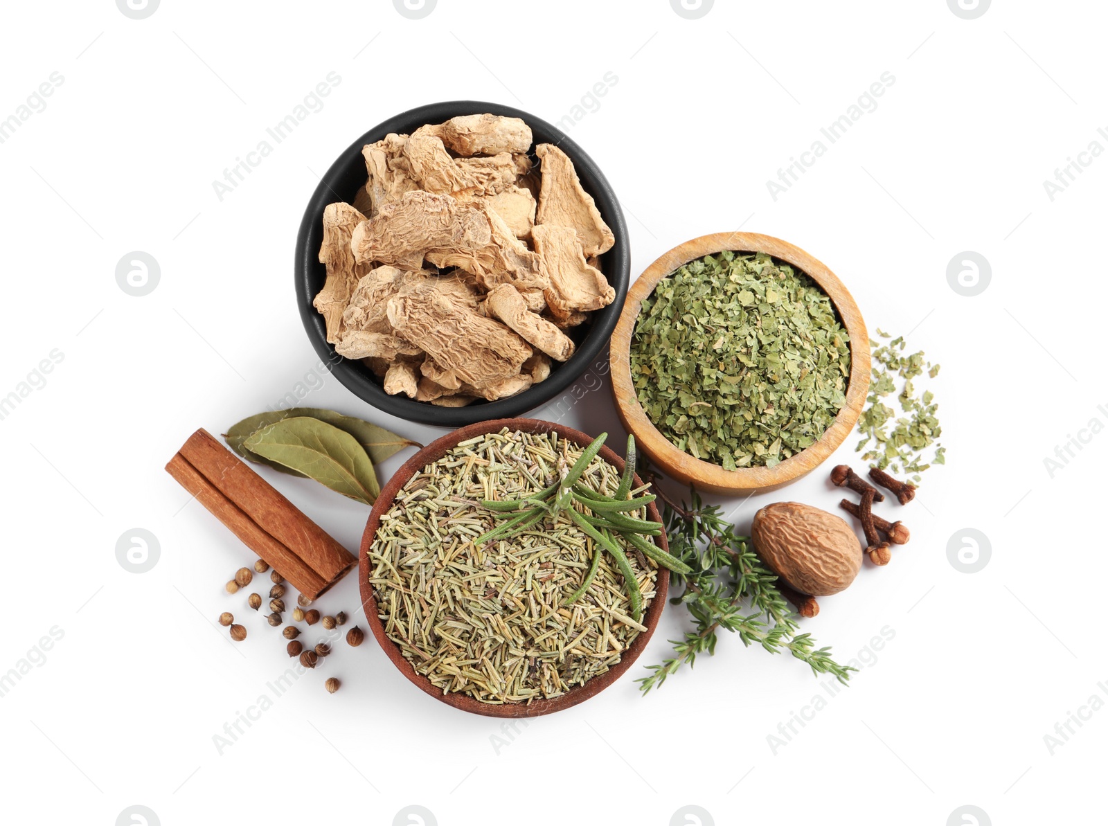 Photo of Different natural spices and herbs on white background, top view