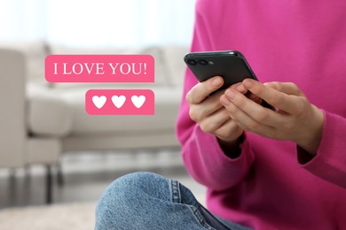 Image of Long distance love. Woman sending or receiving text message, closeup. Hearts and phrase I Love You near device