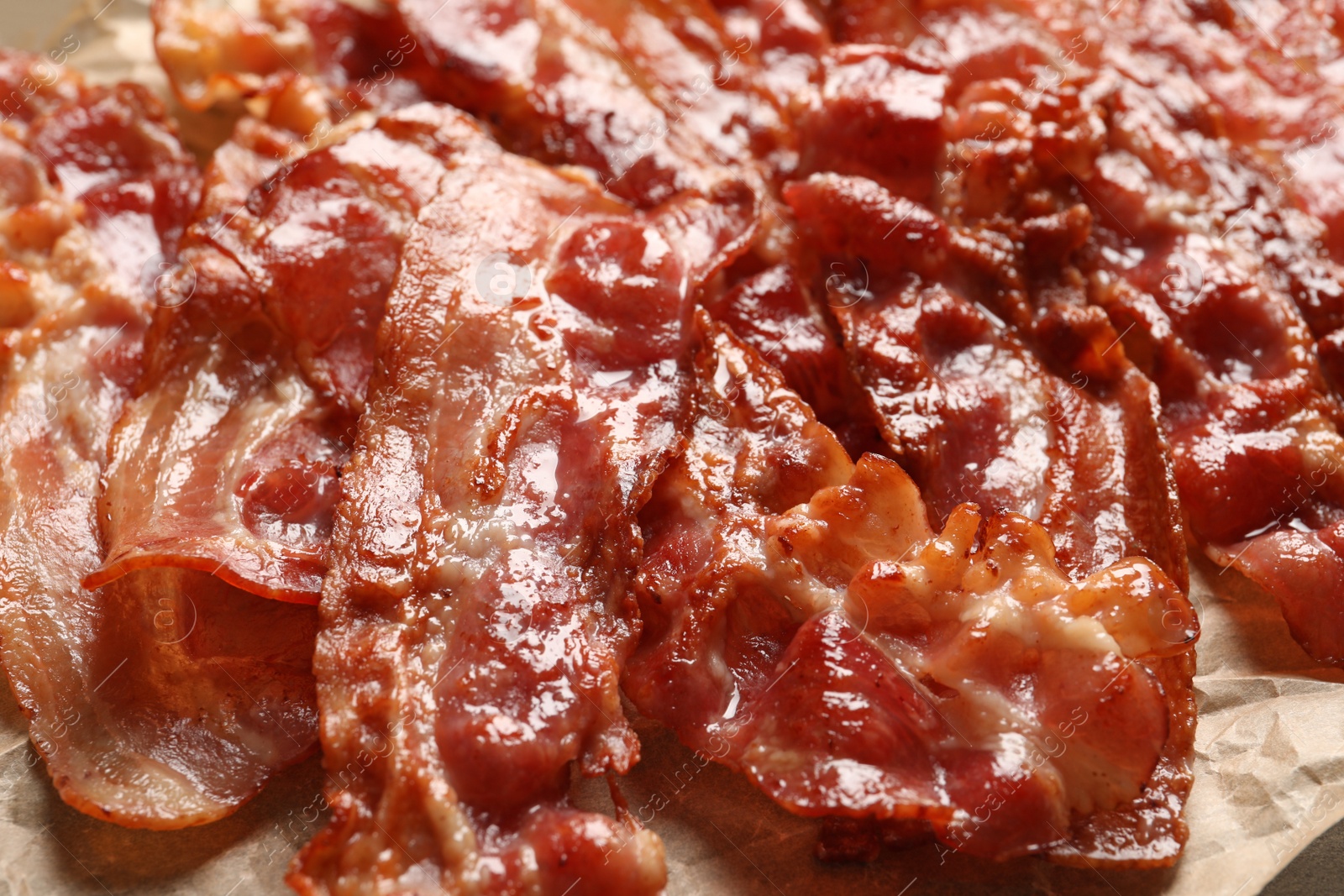 Photo of Tasty fried bacon, closeup