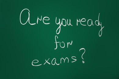 Photo of Green chalkboard with phrase Are You Ready For Exams as background