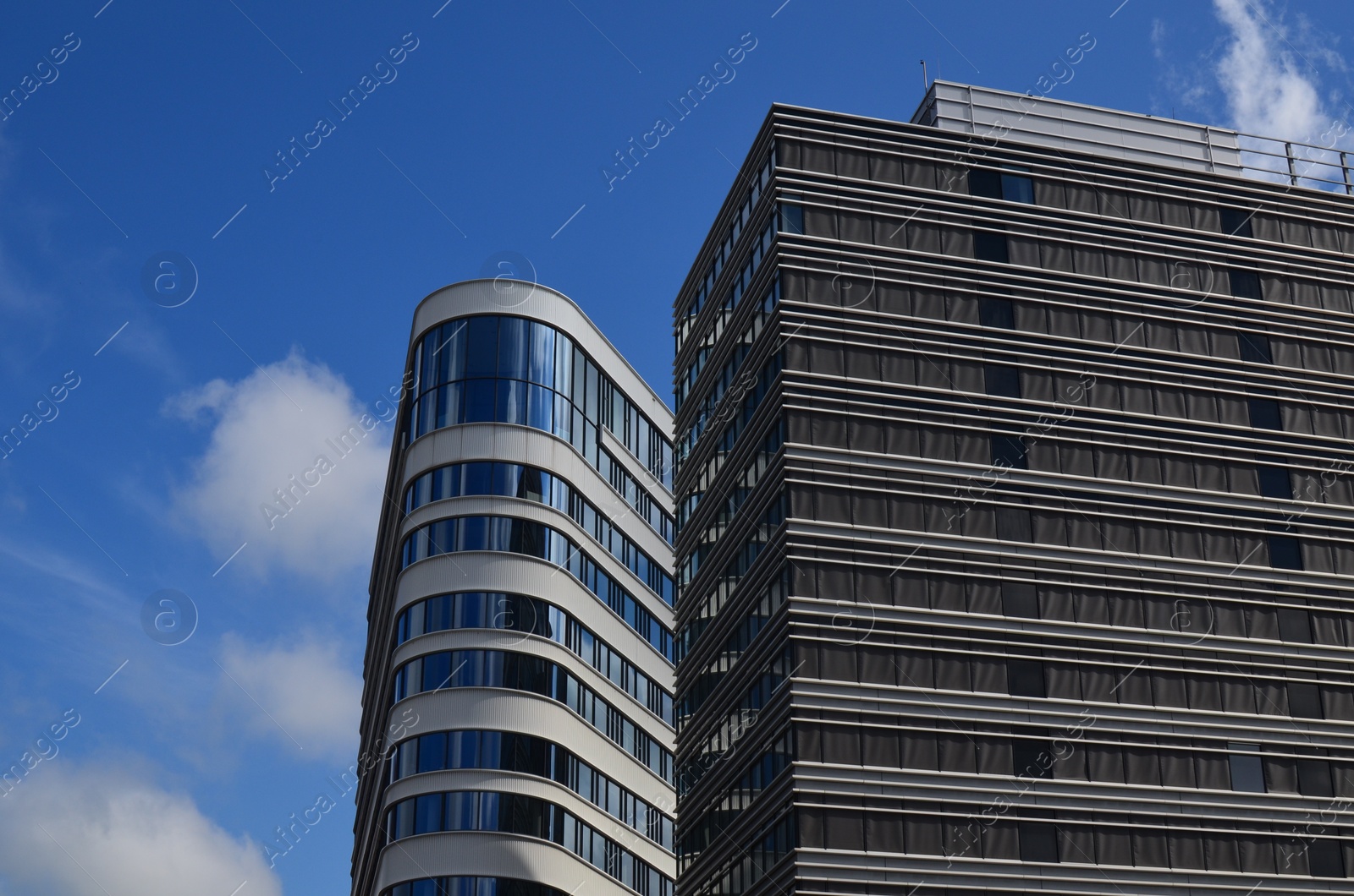 Photo of Exterior of beautiful buildings against blue sky