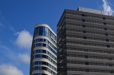 Photo of Exterior of beautiful buildings against blue sky