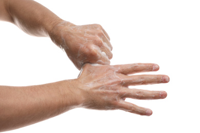 Photo of Man washing hands with soap on white background, closeup