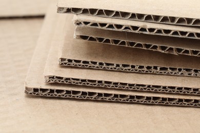 Photo of Sheets of brown corrugated cardboard, closeup view