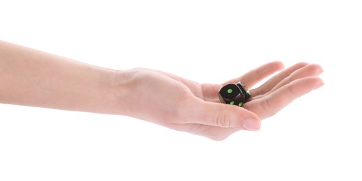 Photo of Woman throwing game dices on white background, closeup