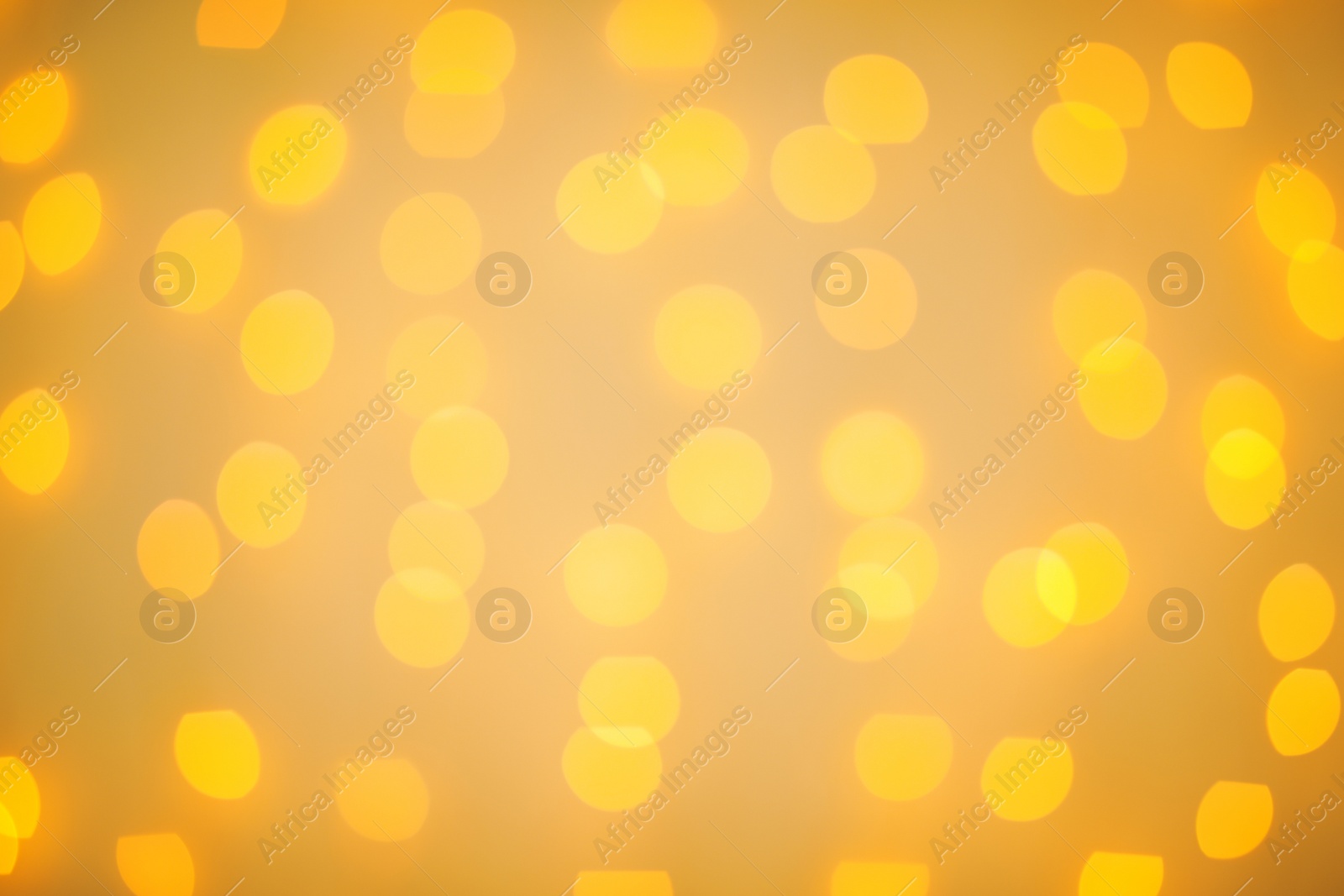 Photo of Beautiful gold lights as background. Bokeh effect