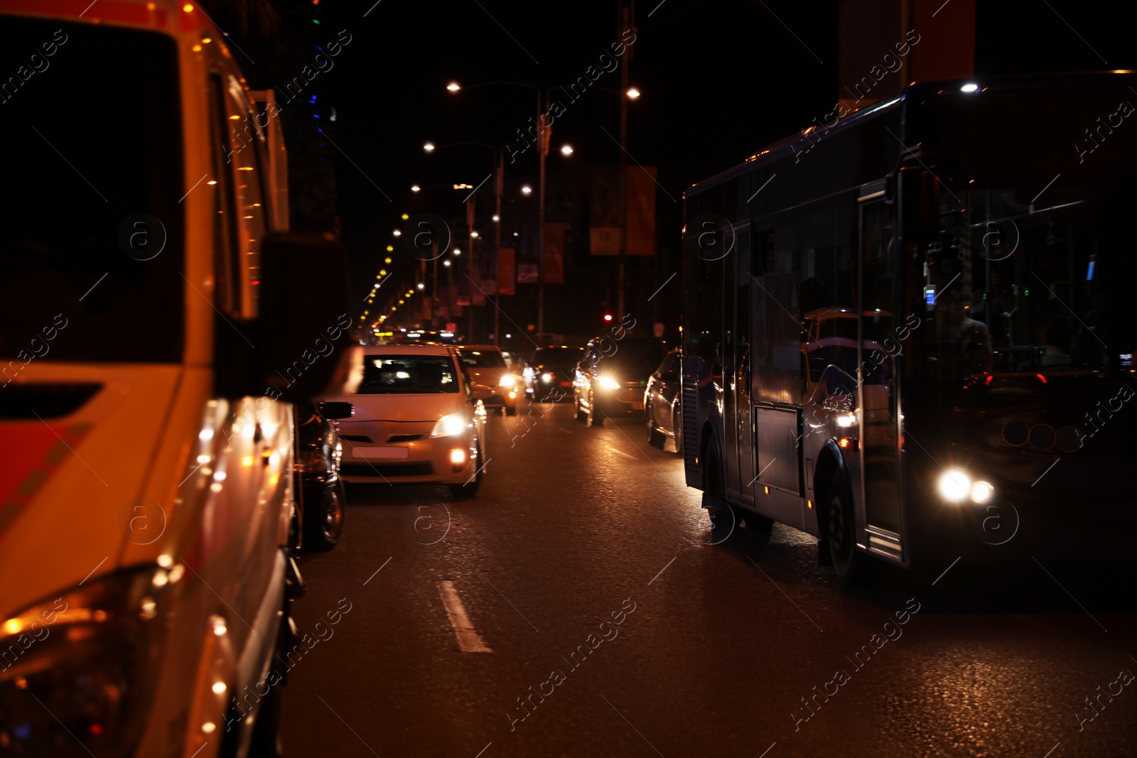 Photo of Blurred view of cityscape with bokeh effect. Night life