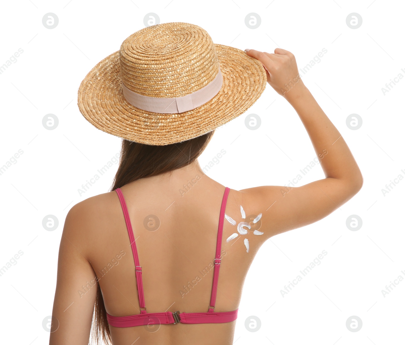 Photo of Teenage girl with sun protection cream on her back against white background